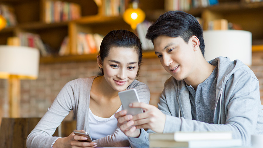 couple looking at a mobile phone