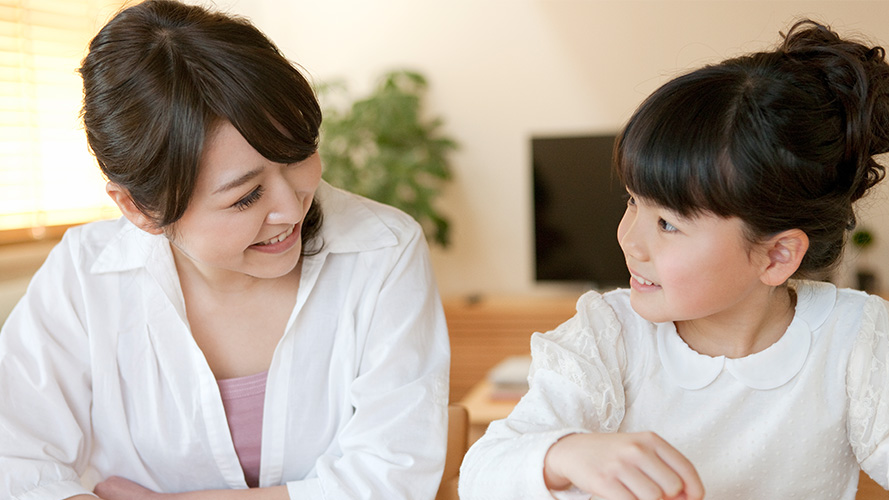 mother daughter and bank piggy; the image used for families through different life cycles